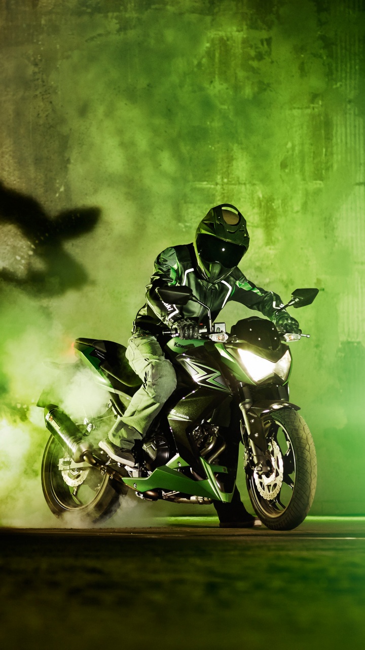 Man Riding Motorcycle on Road During Daytime. Wallpaper in 720x1280 Resolution