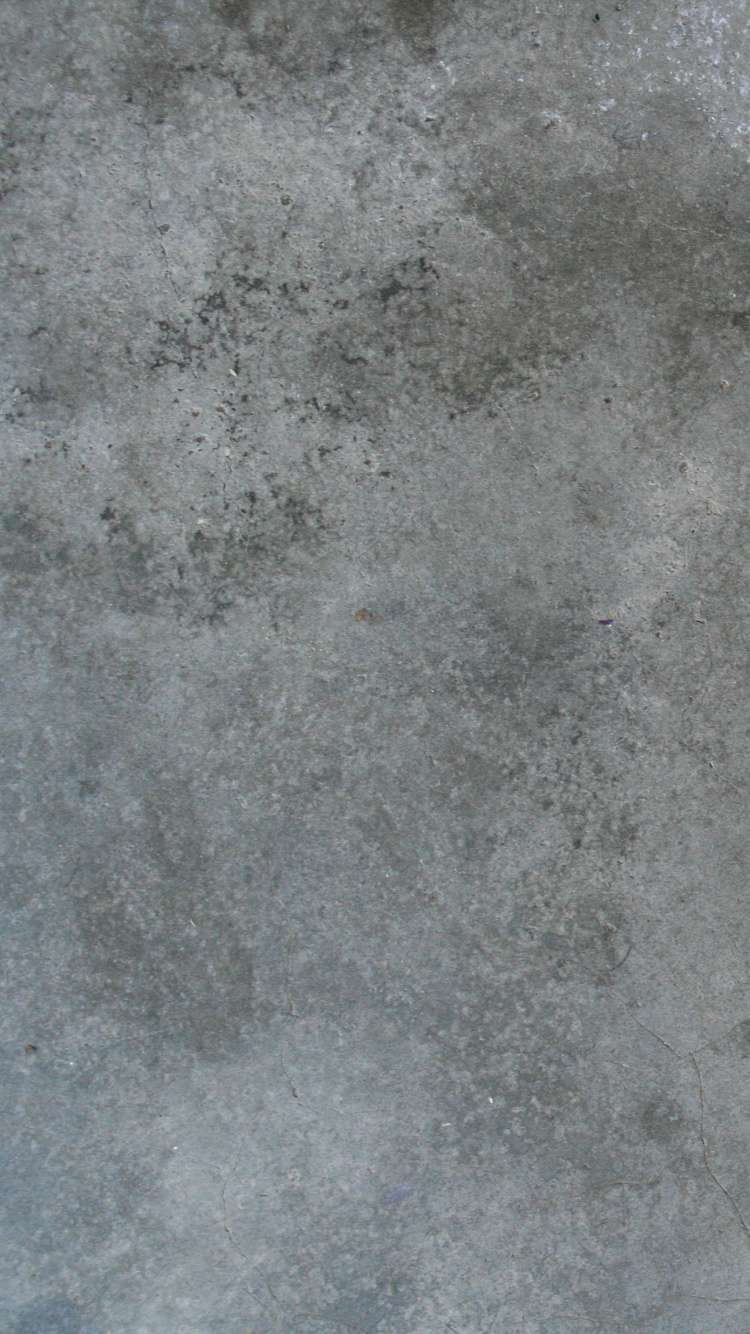 Person in Blauen Jeans Und Schwarzen Schuhen, Die Auf Grauem Betonboden Steht. Wallpaper in 750x1334 Resolution