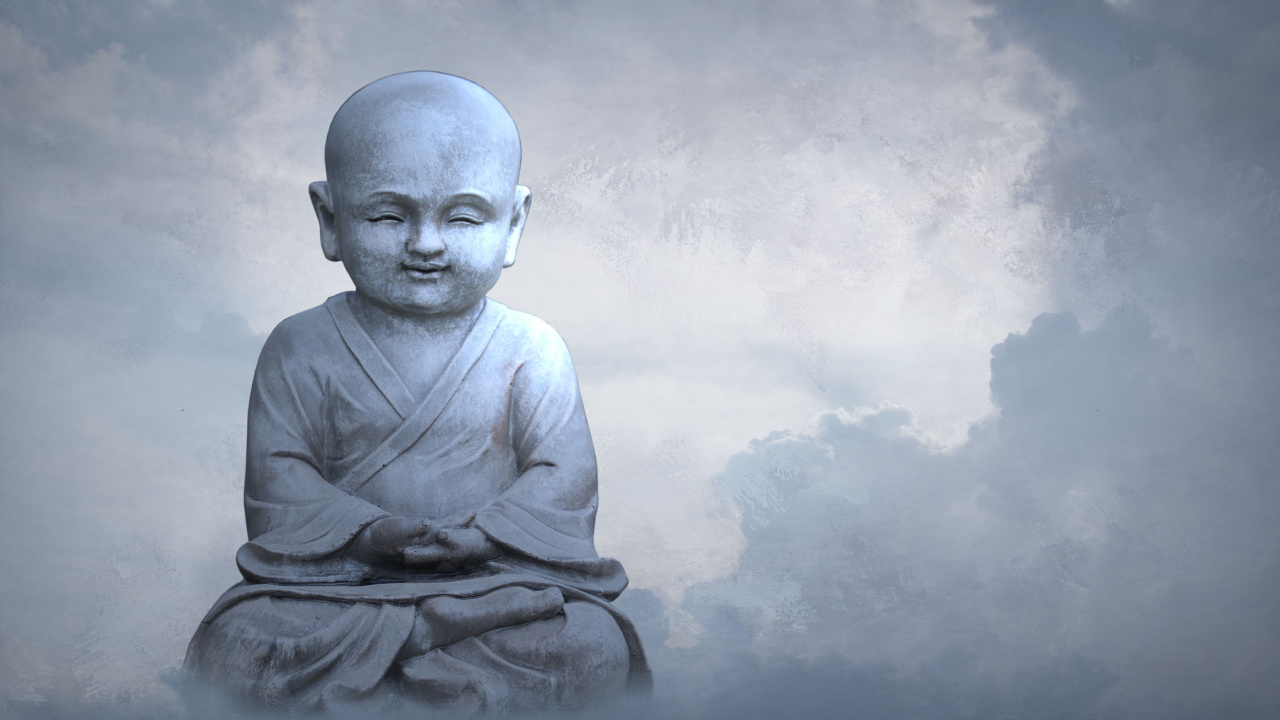 Man in Gray Long Sleeve Shirt Sitting on Rock. Wallpaper in 1280x720 Resolution