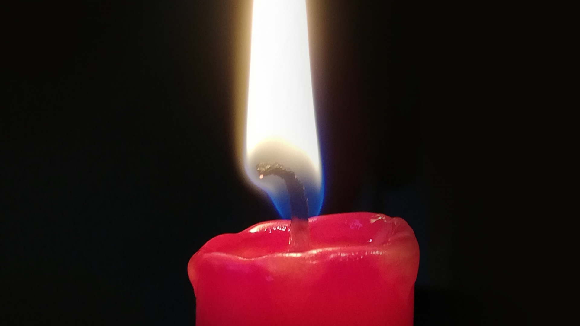 Red Pillar Candle With Black Background. Wallpaper in 1920x1080 Resolution
