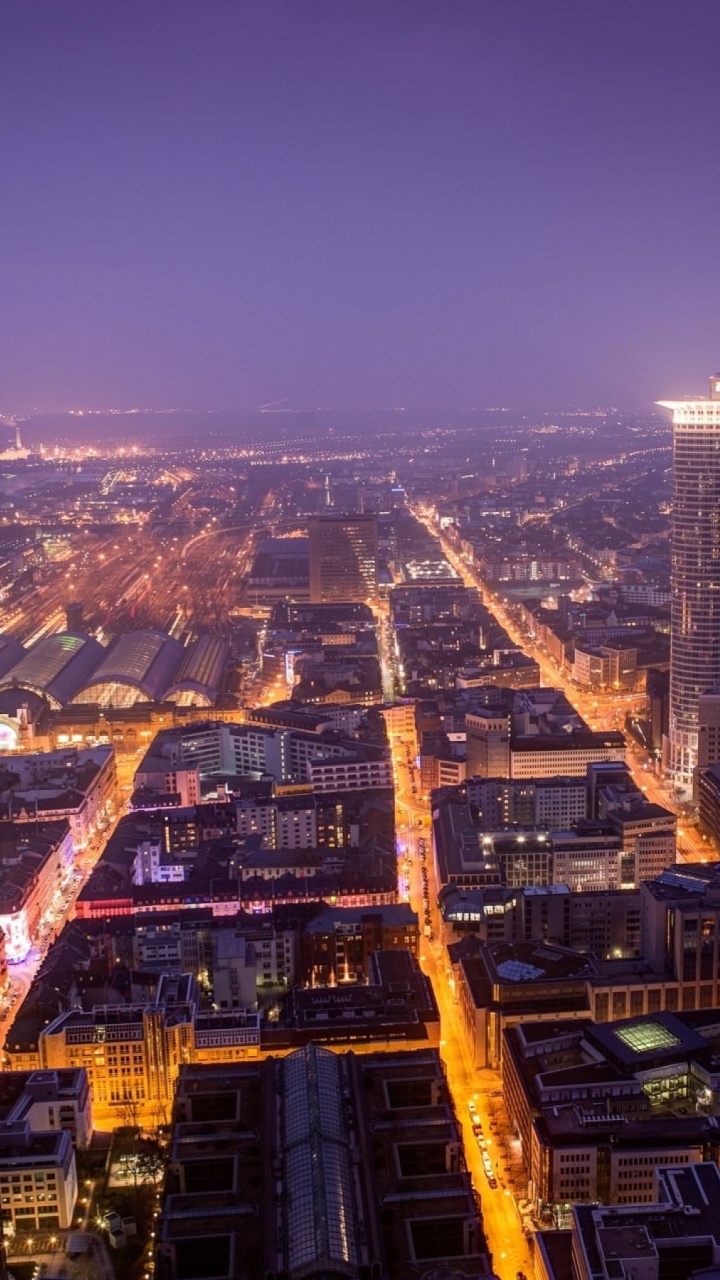Vue Aérienne Des Bâtiments de la Ville Pendant la Nuit. Wallpaper in 720x1280 Resolution