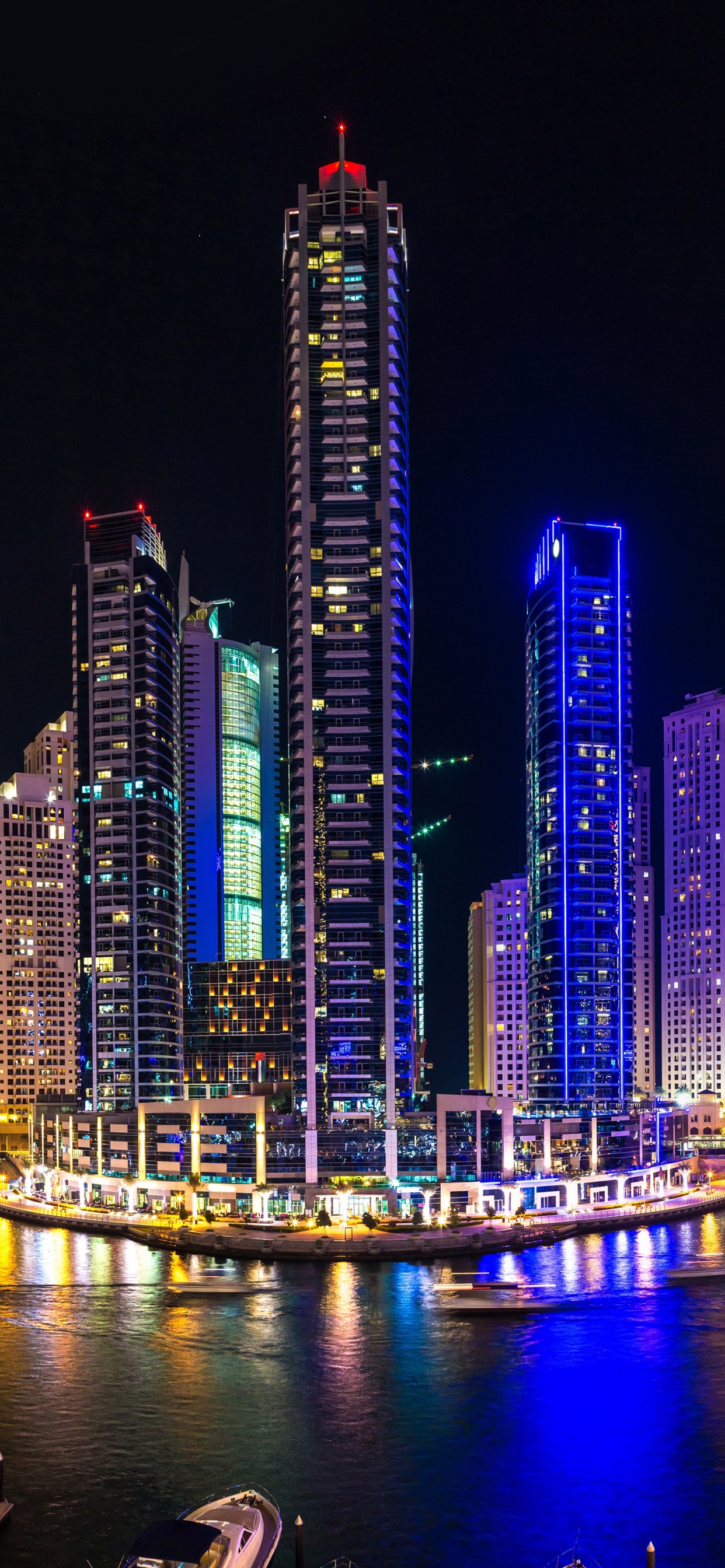 Horizonte de la Ciudad Durante la Noche. Wallpaper in 1242x2688 Resolution