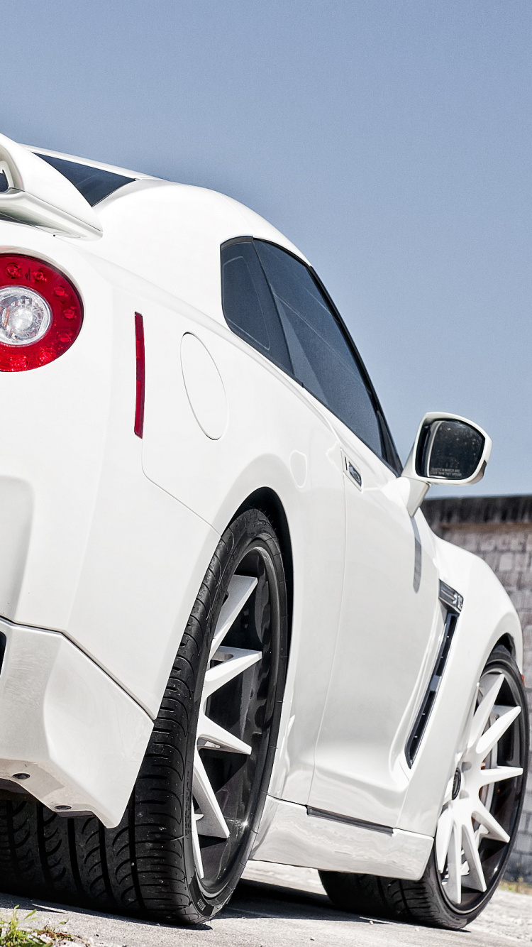 White Porsche 911 Parked on Road During Daytime. Wallpaper in 750x1334 Resolution