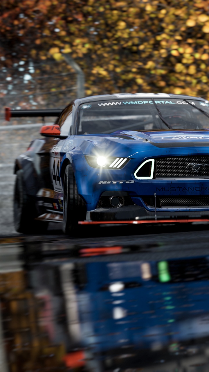 Blauer Porsche 911 Tagsüber Unterwegs. Wallpaper in 720x1280 Resolution