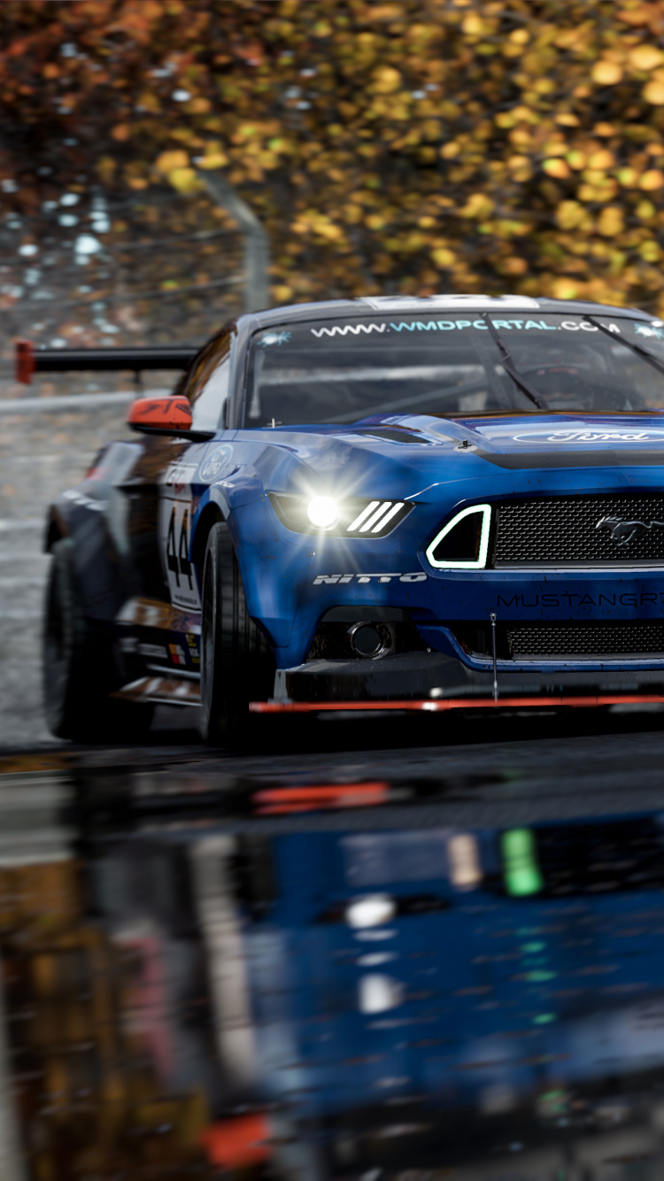 Blauer Porsche 911 Tagsüber Unterwegs. Wallpaper in 750x1334 Resolution