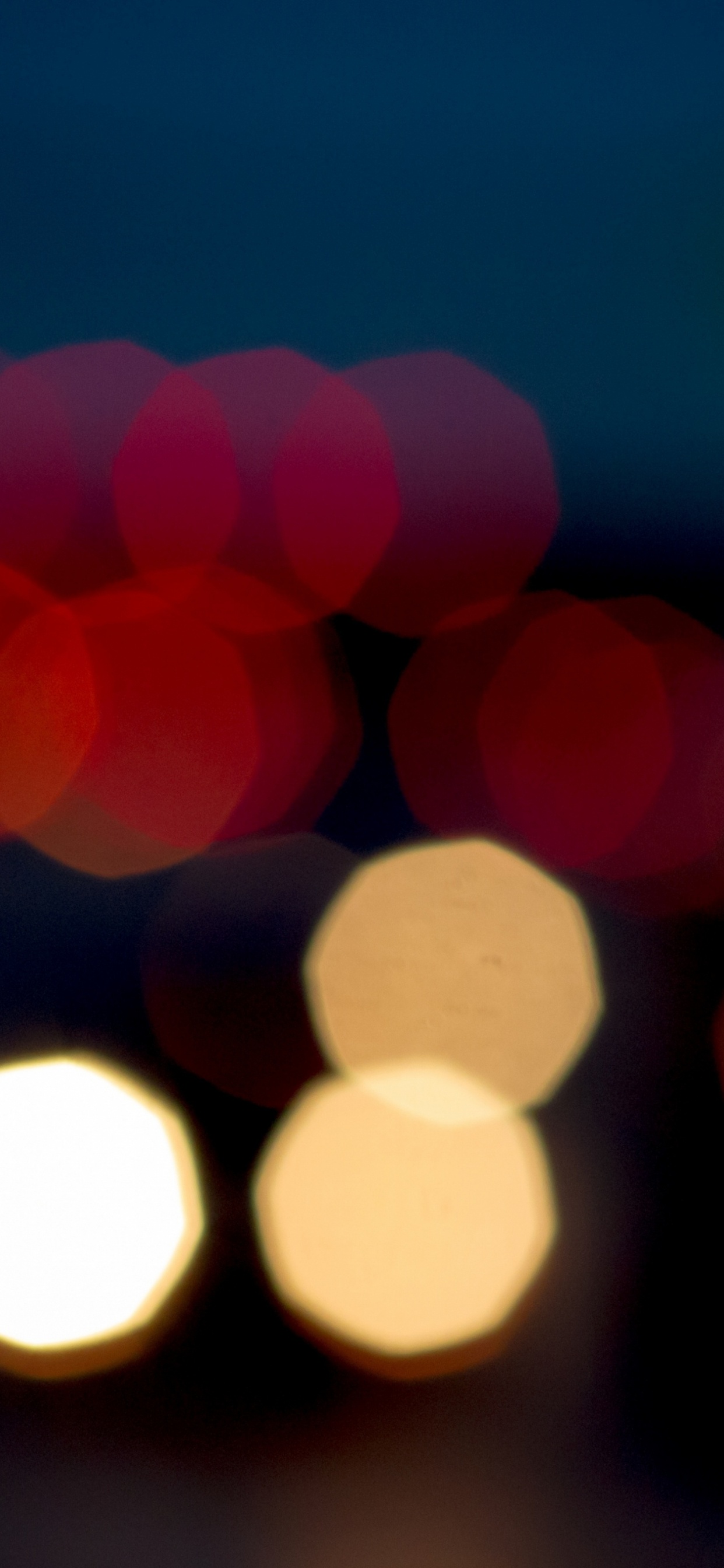 Red and Yellow Bokeh Lights. Wallpaper in 1242x2688 Resolution