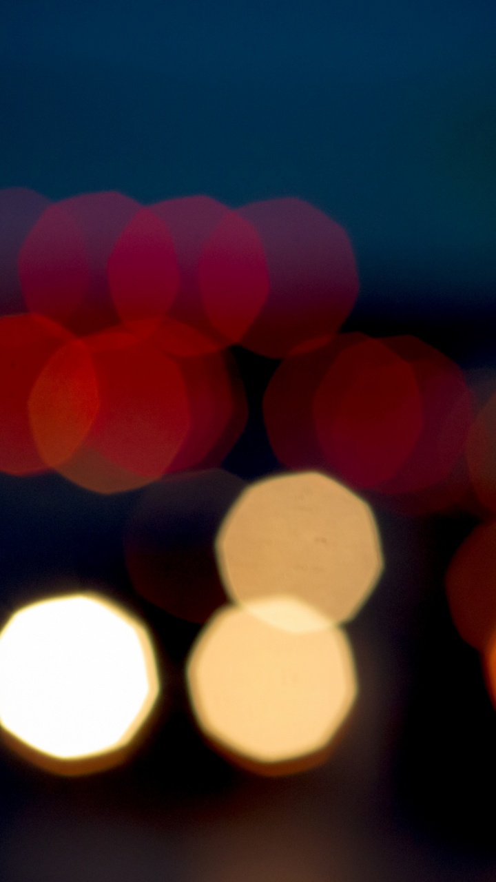 Rote Und Gelbe Bokeh-Lichter. Wallpaper in 720x1280 Resolution