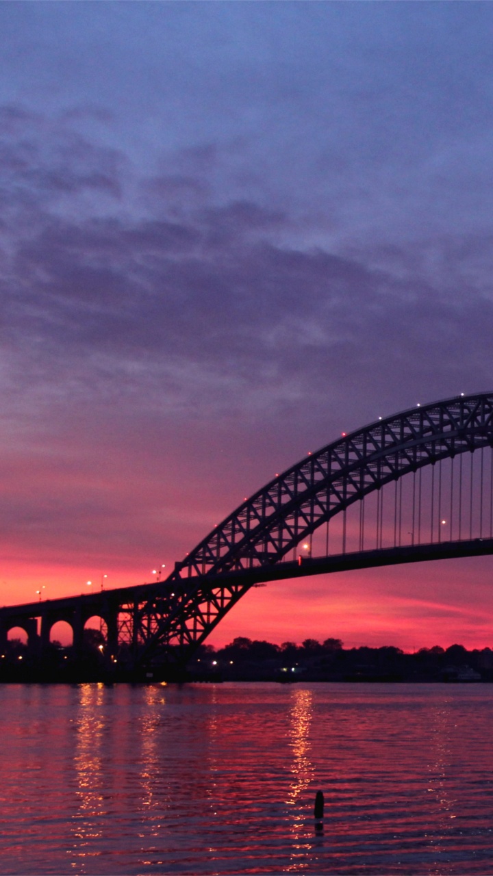 Black Metal Bridge Under Gray Clouds. Wallpaper in 720x1280 Resolution