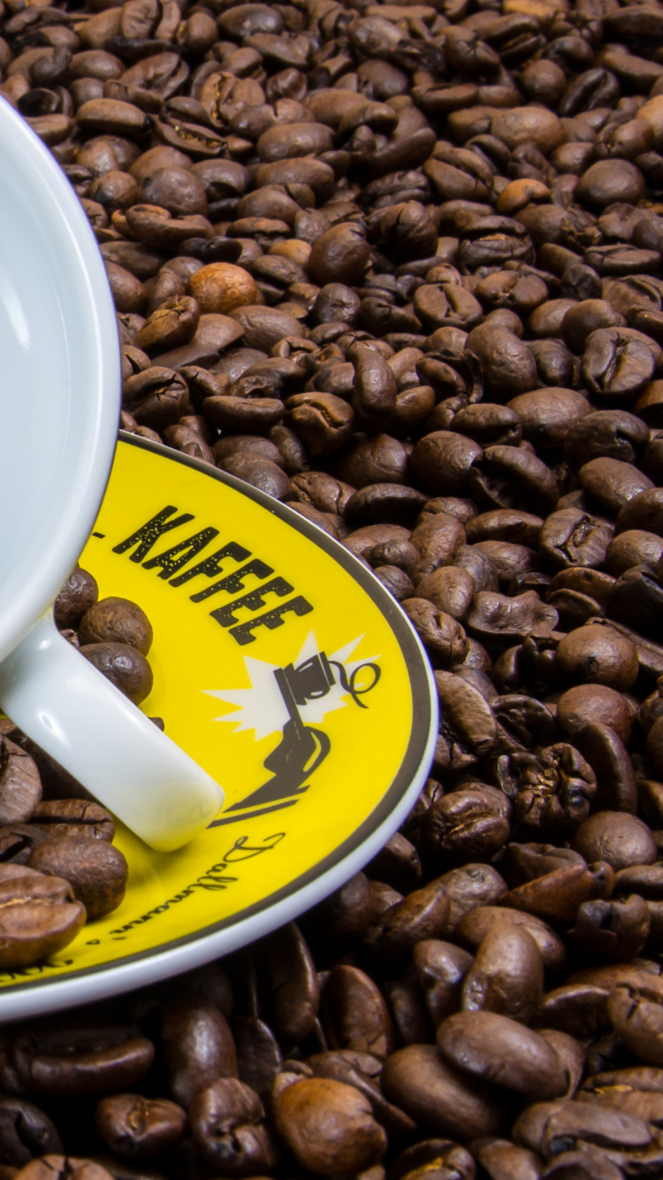 White Ceramic Mug on Coffee Beans. Wallpaper in 750x1334 Resolution