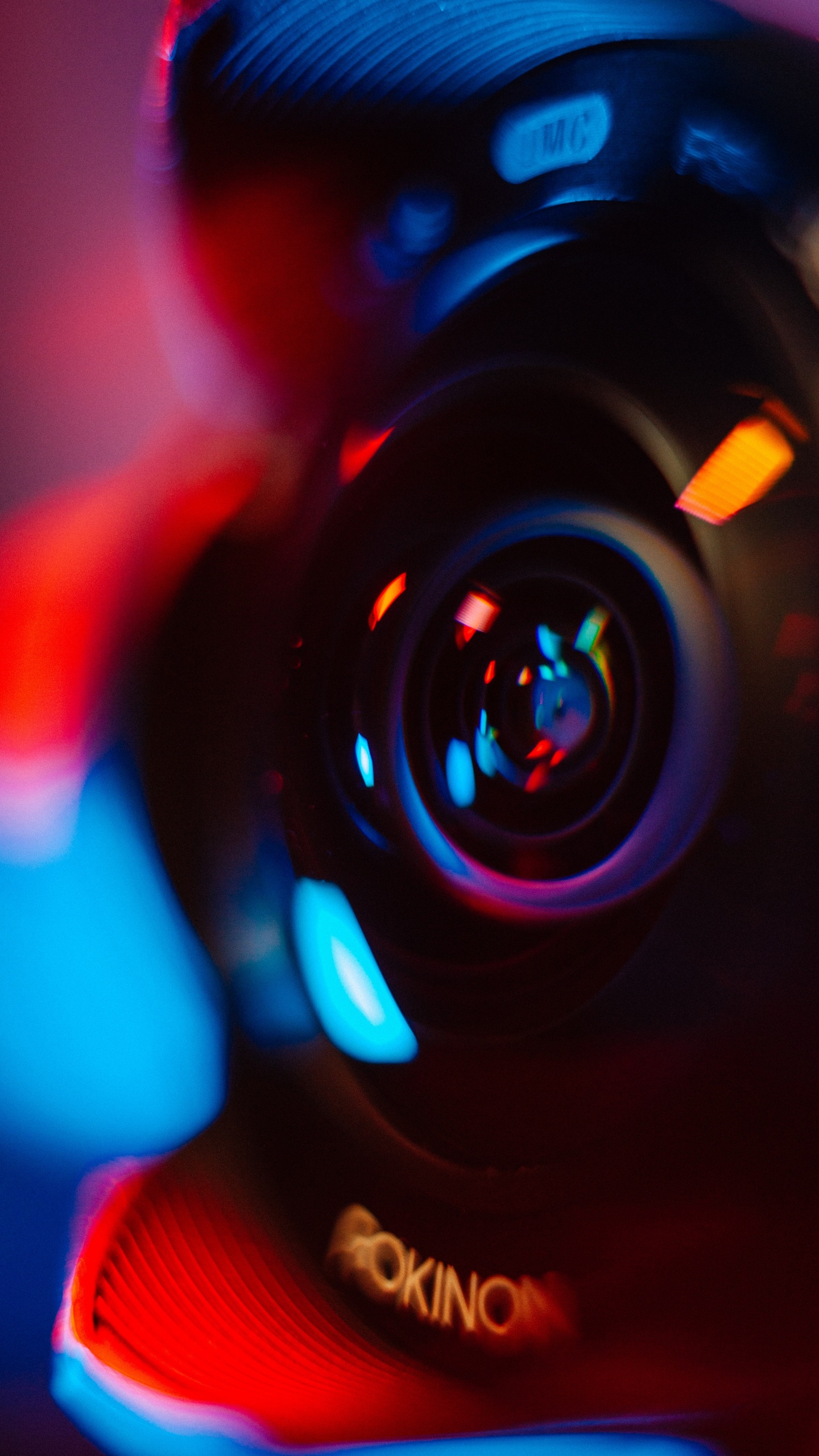 Black and Orange Camera Lens. Wallpaper in 1440x2560 Resolution