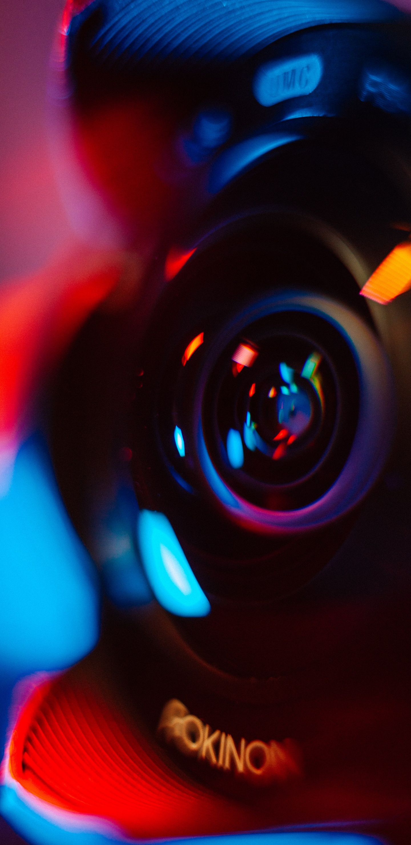 Black and Orange Camera Lens. Wallpaper in 1440x2960 Resolution