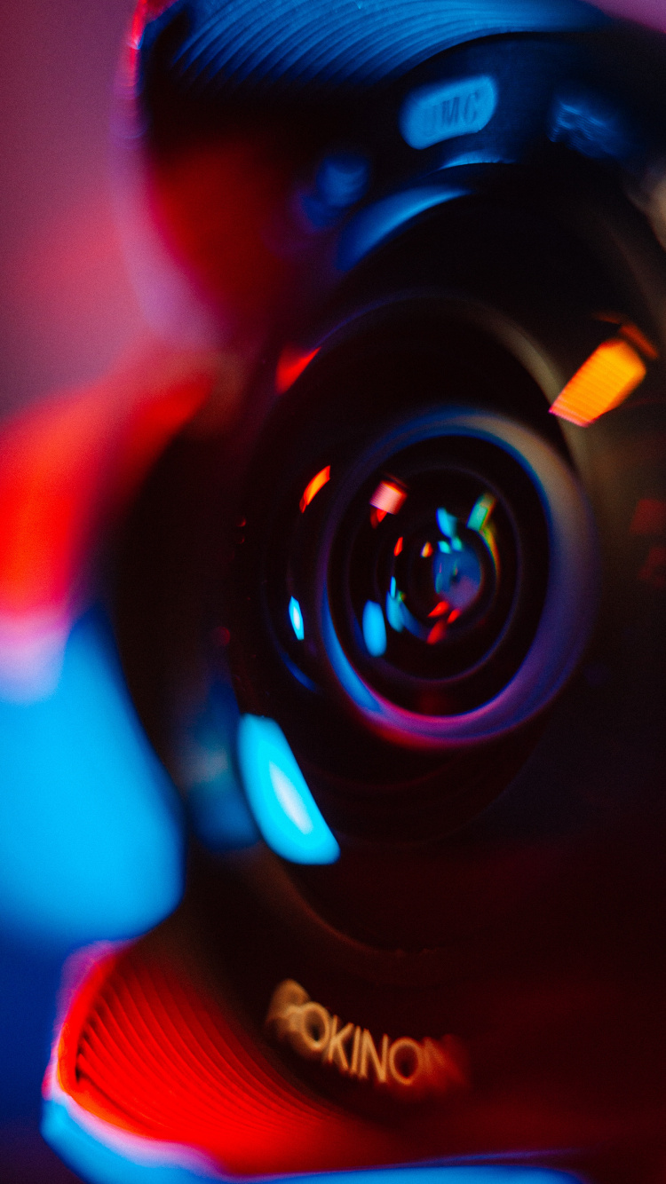 Black and Orange Camera Lens. Wallpaper in 750x1334 Resolution