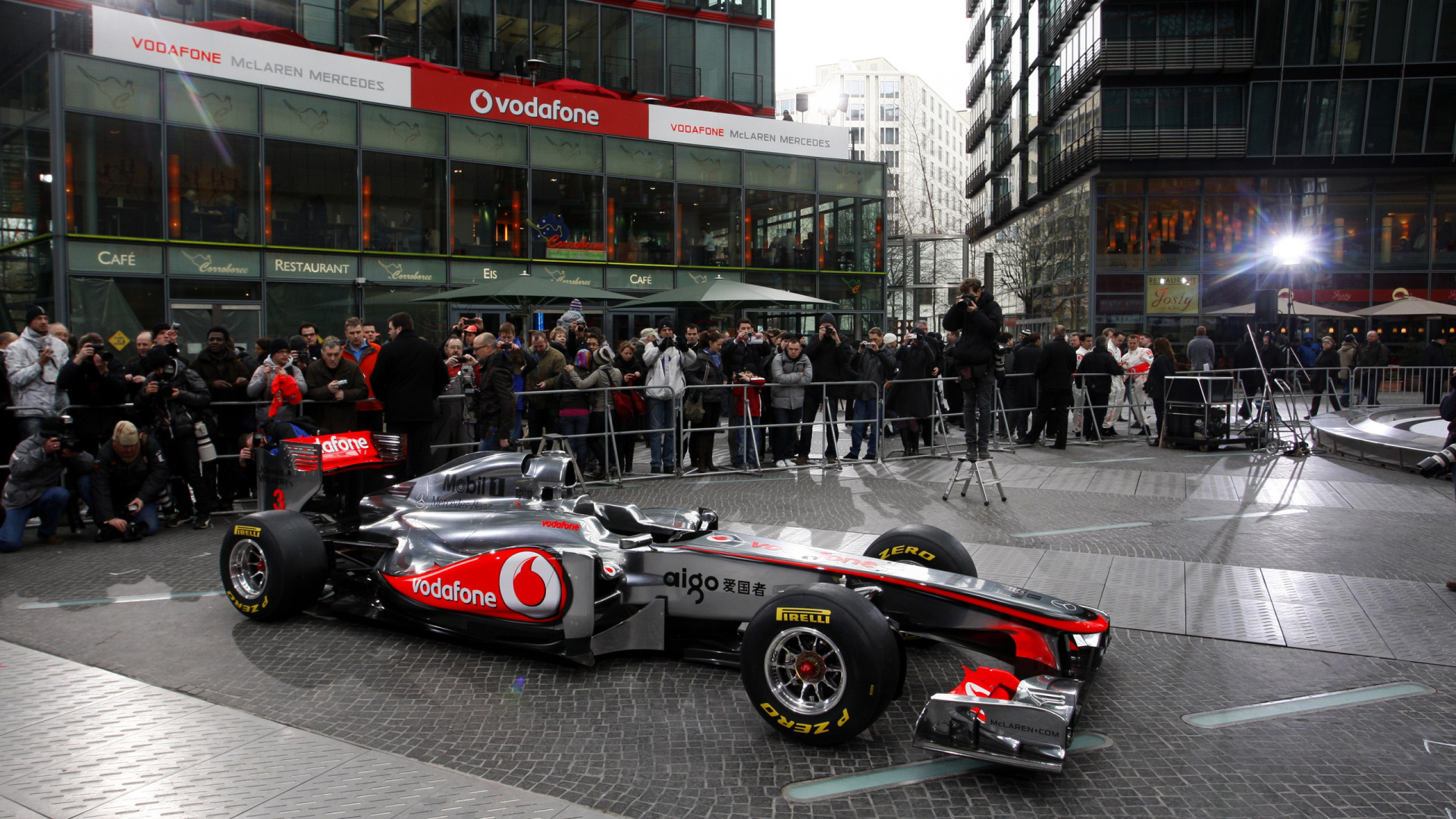 Black and Red Ferrari f 1 on Road During Daytime. Wallpaper in 1920x1080 Resolution