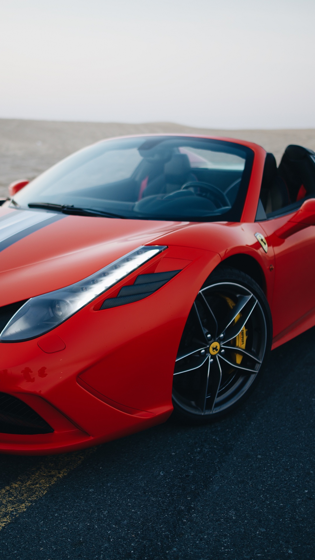 Red Ferrari Sports Car on Black Asphalt Road During Daytime. Wallpaper in 1080x1920 Resolution