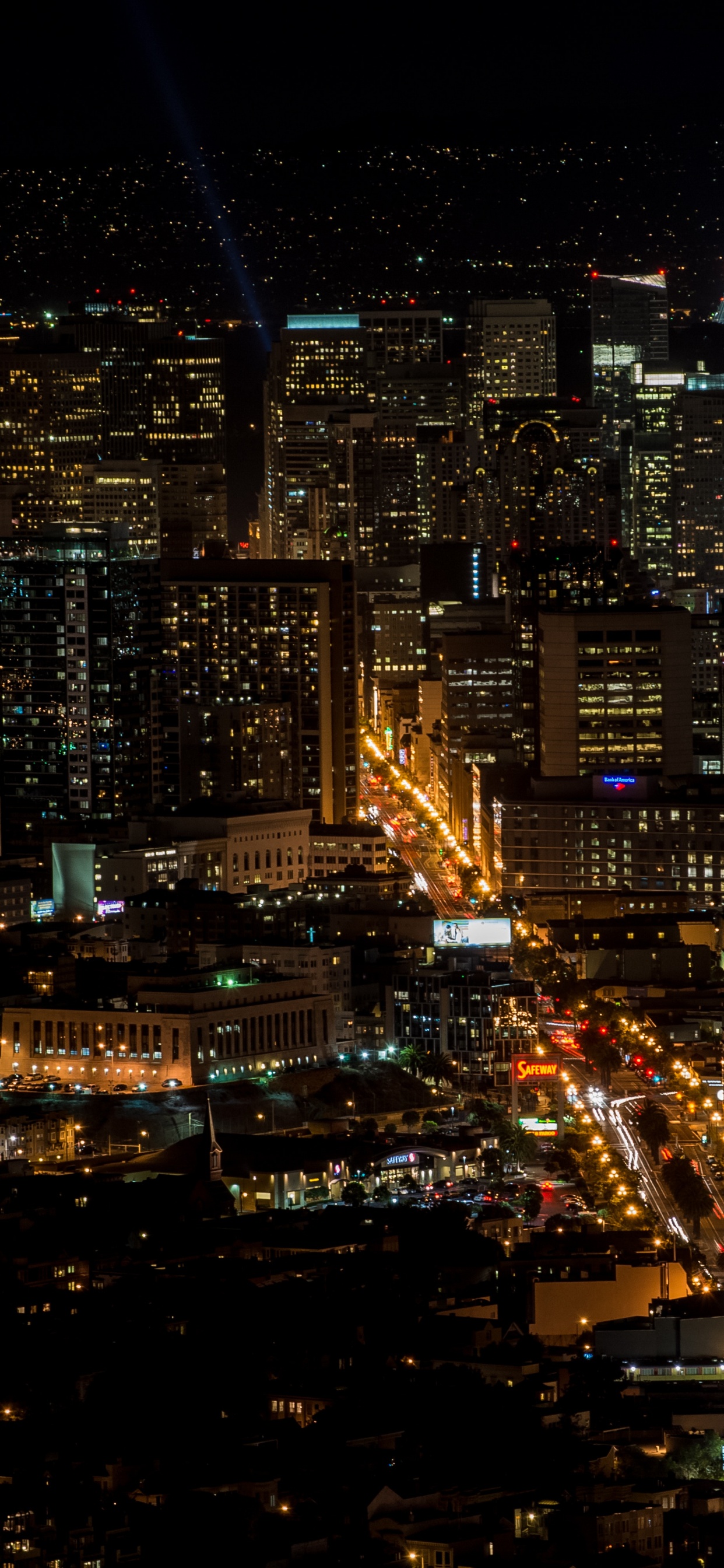 City With High Rise Buildings During Night Time. Wallpaper in 1242x2688 Resolution