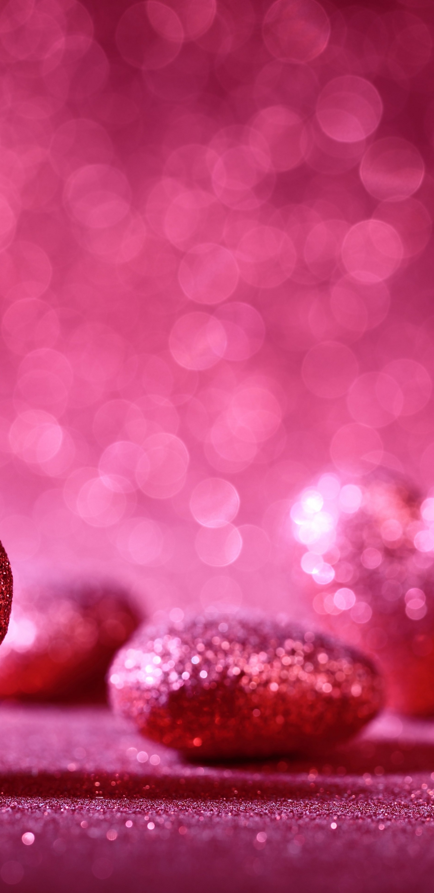 Black and Red Heart Shaped Stones on Red Surface. Wallpaper in 1440x2960 Resolution