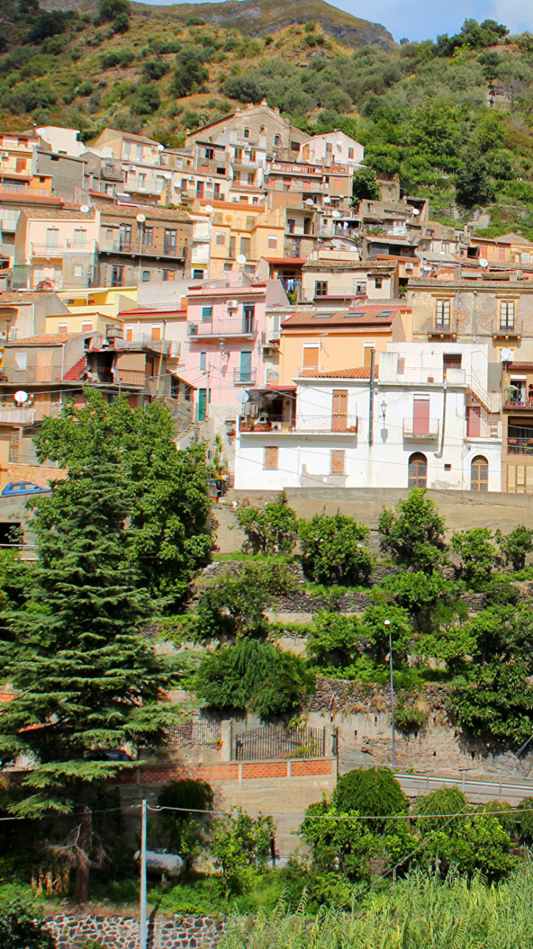 White and Brown Concrete Buildings Near Green Trees During Daytime. Wallpaper in 750x1334 Resolution