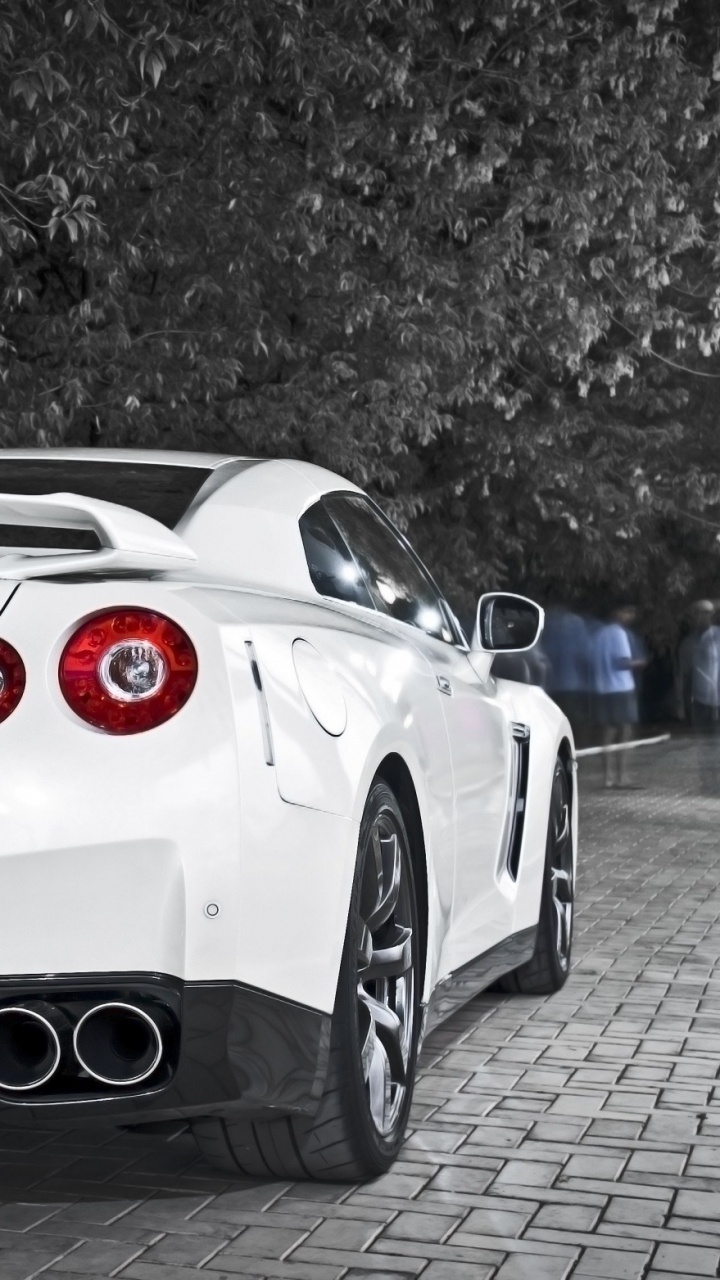 White Porsche 911 on Black and Gray Surface. Wallpaper in 720x1280 Resolution