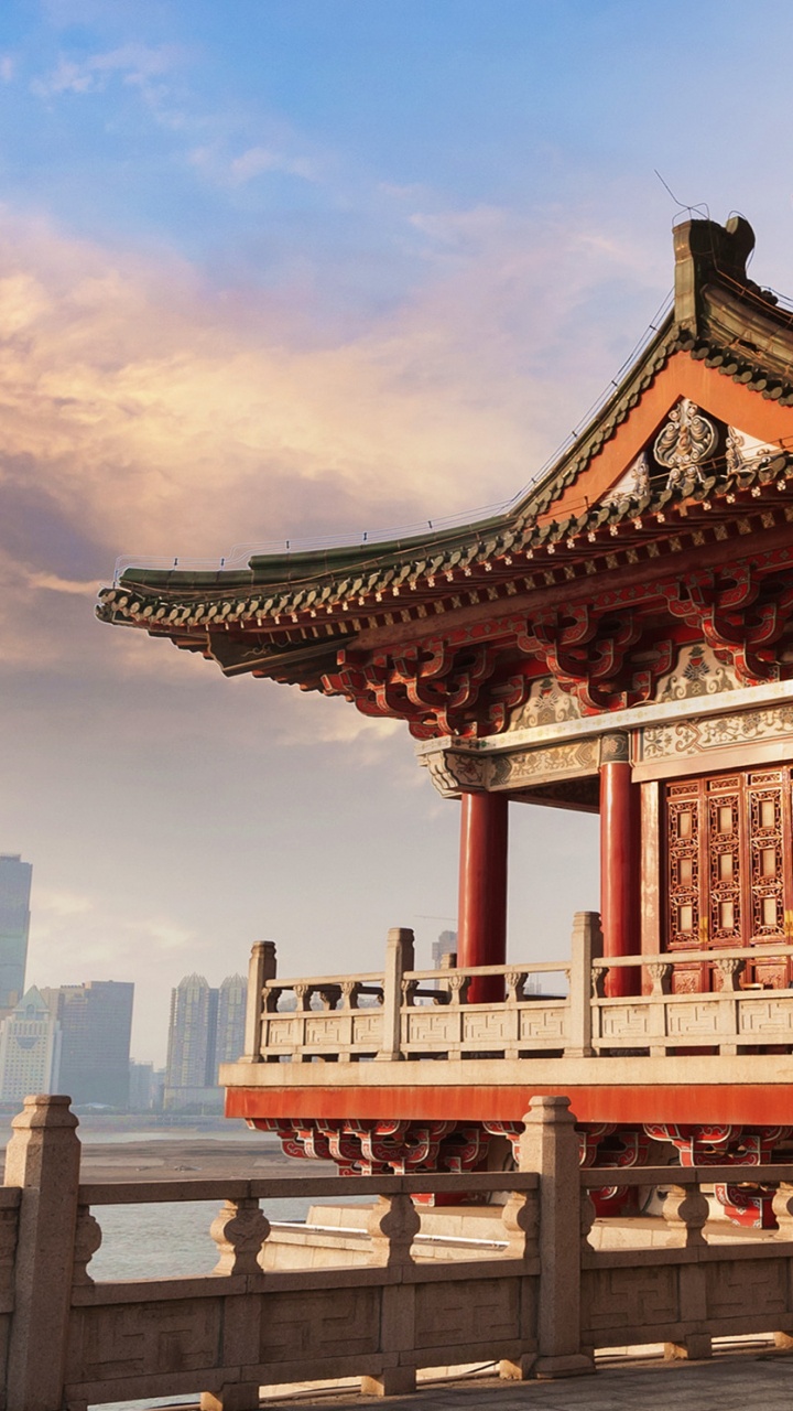 Red and White Temple Near Body of Water During Daytime. Wallpaper in 720x1280 Resolution