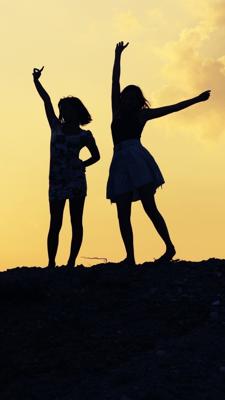 Silhouette of 2 Women Standing on Ground During Sunset. Wallpaper in 720x1280 Resolution
