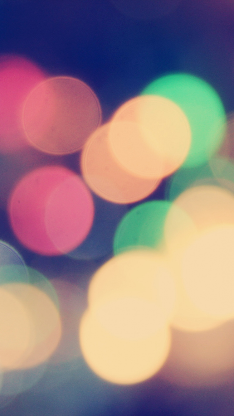 Red and Yellow Bokeh Lights. Wallpaper in 750x1334 Resolution