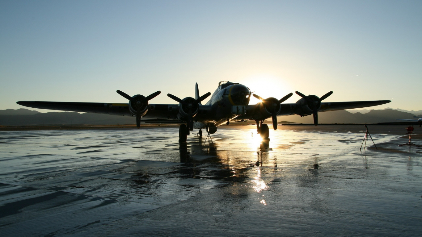 Black Fighter Plane on Mid Air During Daytime. Wallpaper in 1366x768 Resolution