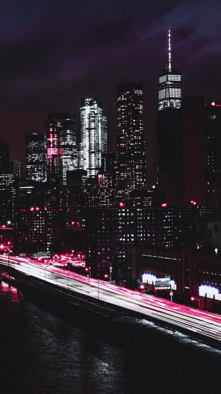 City Skyline During Night Time. Wallpaper in 720x1280 Resolution