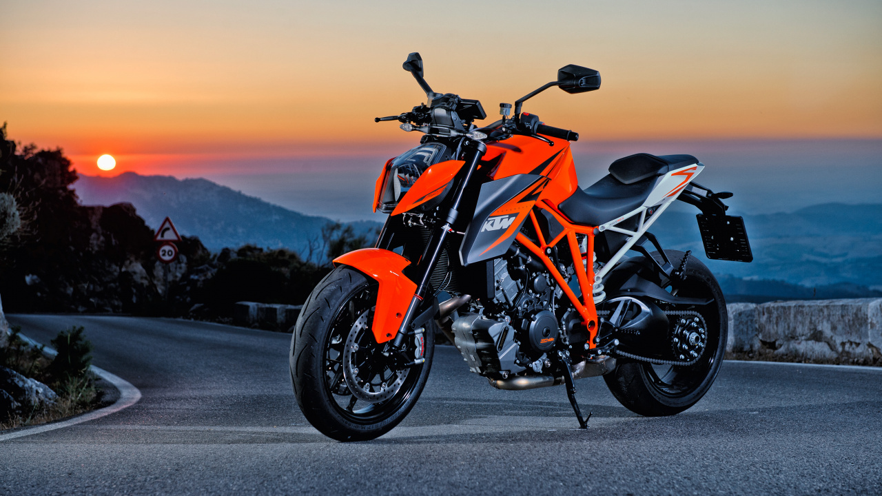 Orange and Black Sports Bike on Road During Daytime. Wallpaper in 1280x720 Resolution