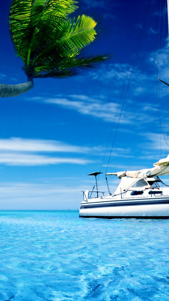 White Sailboat on Blue Sea Under Blue Sky During Daytime. Wallpaper in 720x1280 Resolution