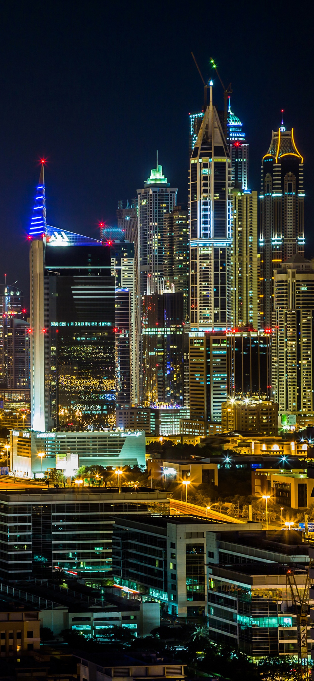 City Skyline During Night Time. Wallpaper in 1242x2688 Resolution