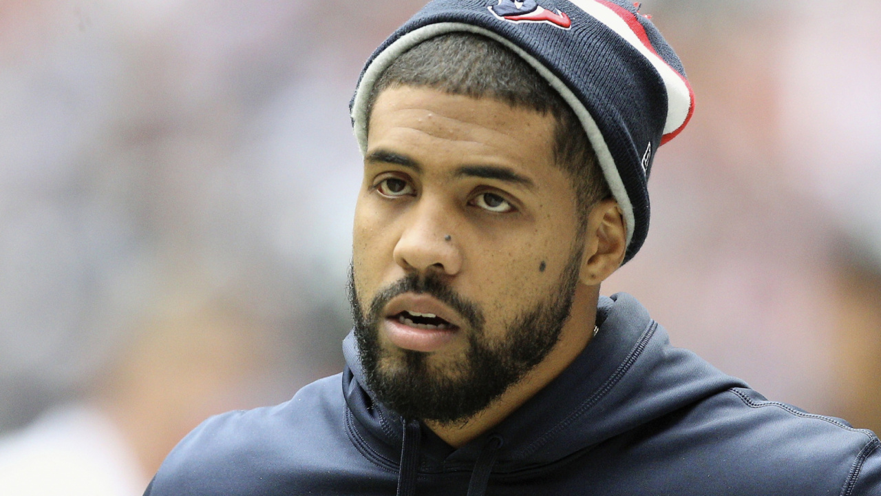 Man in Black and Red Knit Cap and Blue Hoodie. Wallpaper in 1280x720 Resolution