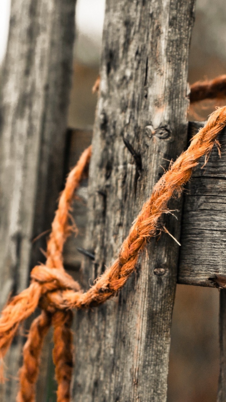 Brown Rope on Brown Wooden Fence. Wallpaper in 720x1280 Resolution