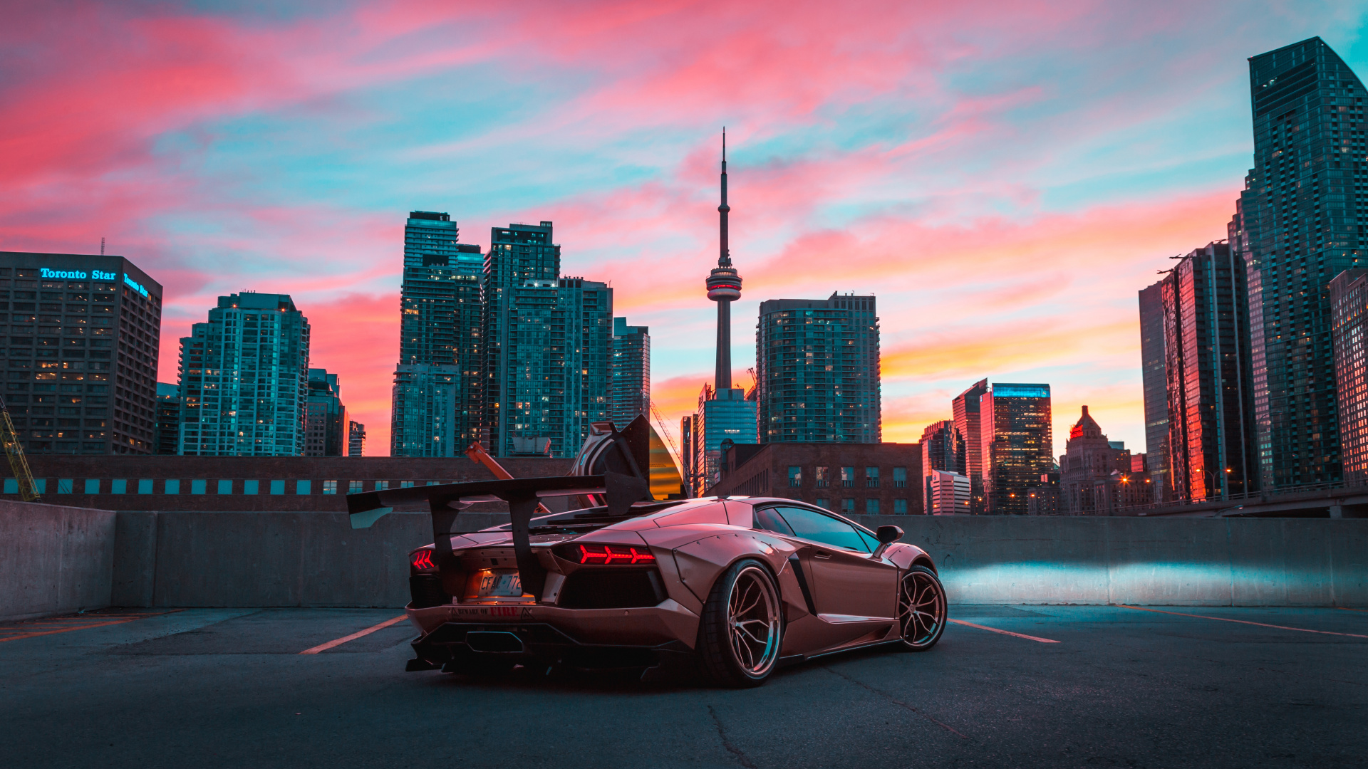 Porsche 911 Negro Estacionado en el Estacionamiento Durante el Día. Wallpaper in 1920x1080 Resolution