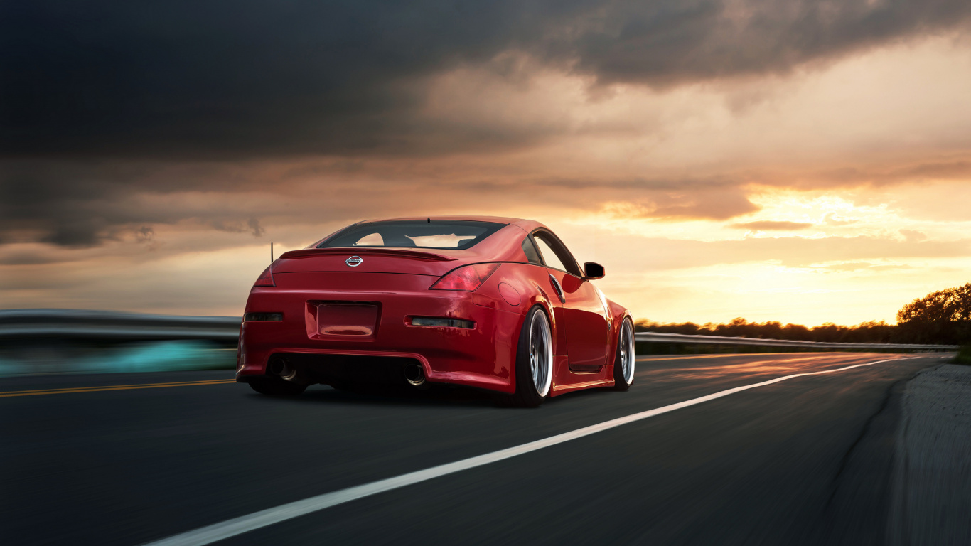 Roter Porsche 911 Tagsüber Unterwegs. Wallpaper in 1366x768 Resolution