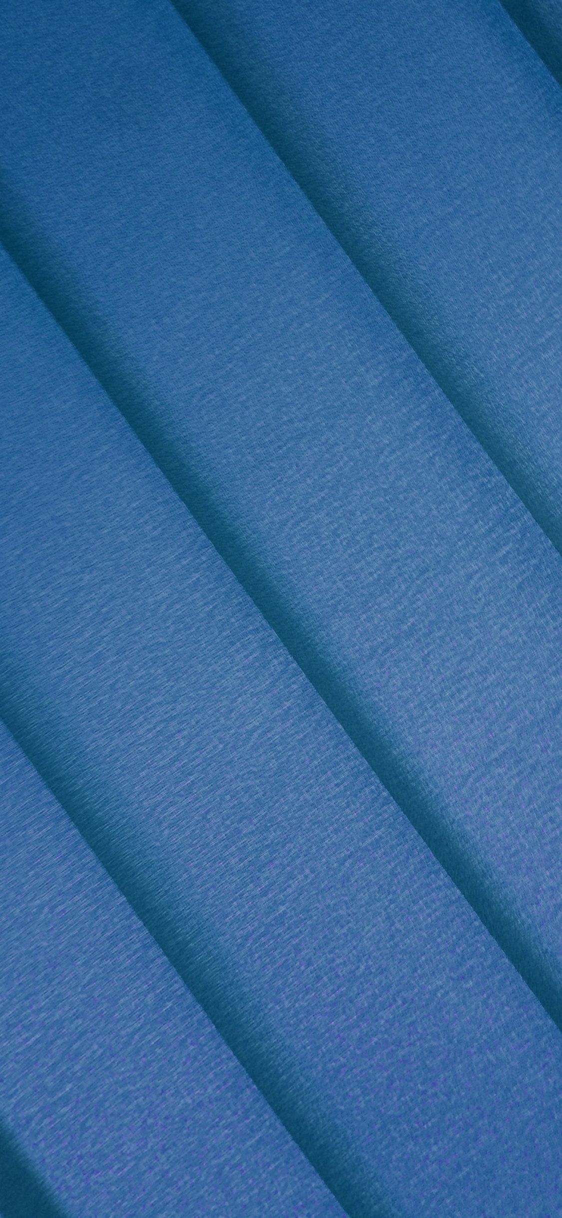 Blue Textile in Close up Photography. Wallpaper in 1125x2436 Resolution