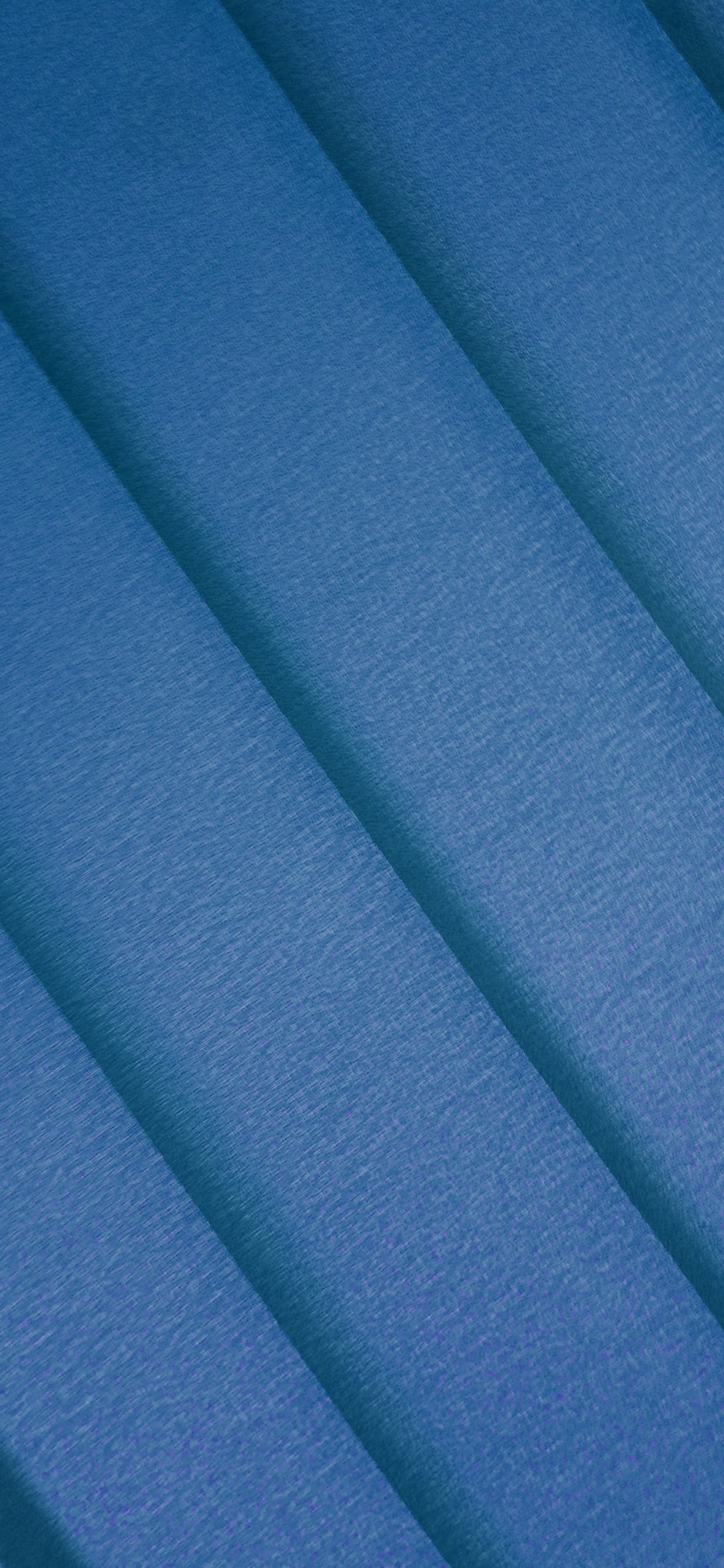 Blue Textile in Close up Photography. Wallpaper in 1242x2688 Resolution