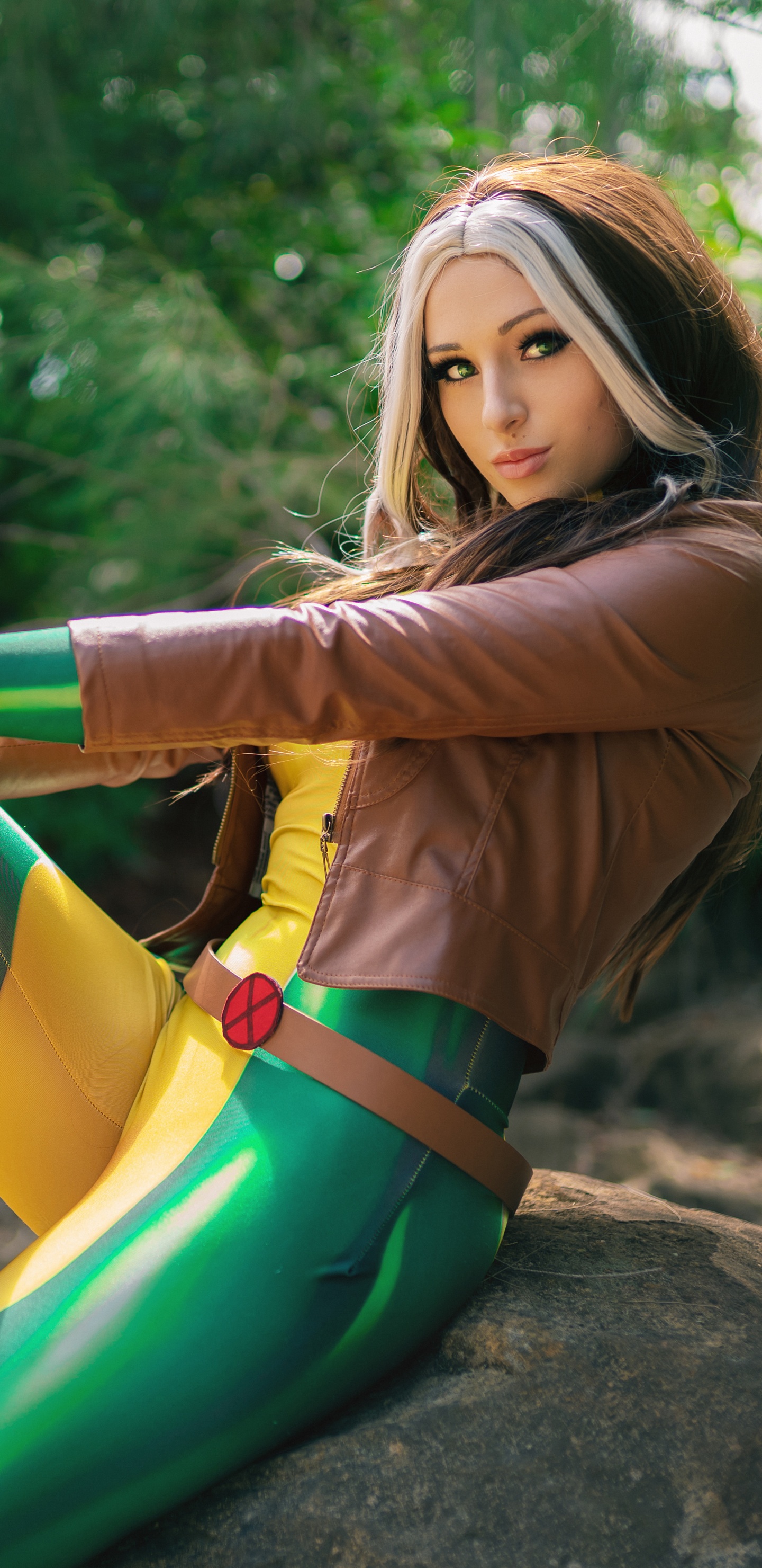 Woman in Yellow Long Sleeve Shirt and Green Pants Lying on Rock. Wallpaper in 1440x2960 Resolution