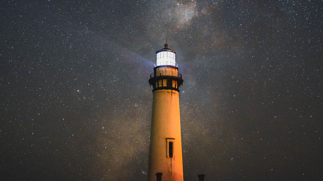 White and Black Light House Under Starry Night. Wallpaper in 1280x720 Resolution