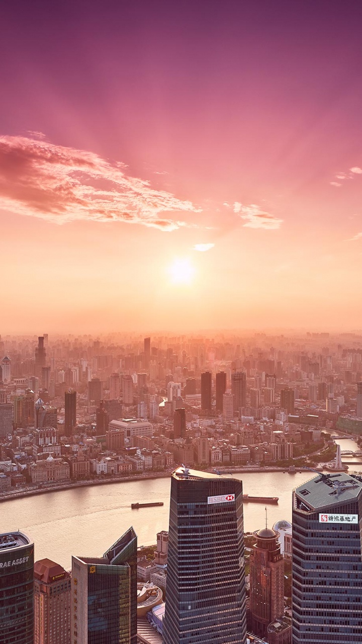 City Skyline During Sunset With City Buildings. Wallpaper in 720x1280 Resolution