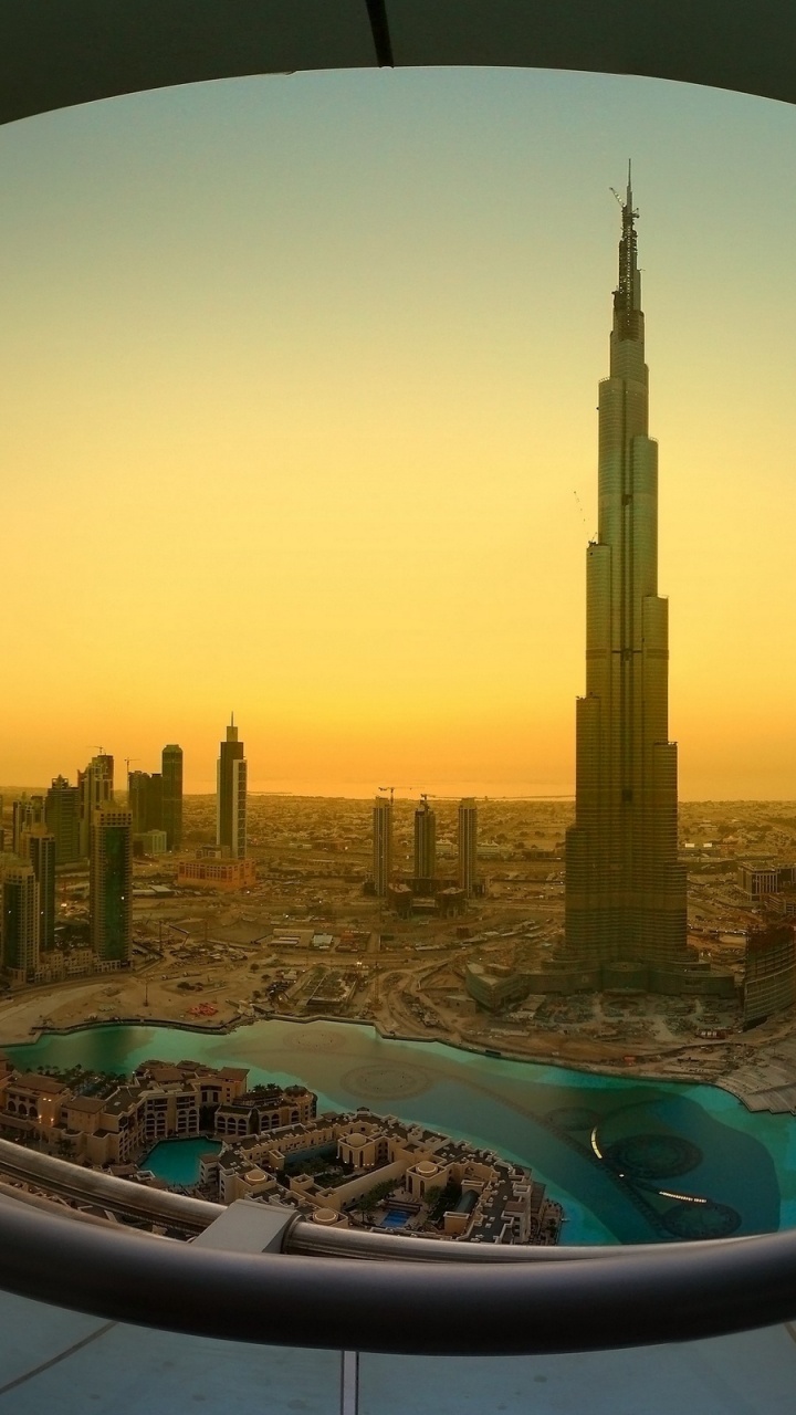 High Rise Buildings Near Body of Water During Daytime. Wallpaper in 720x1280 Resolution