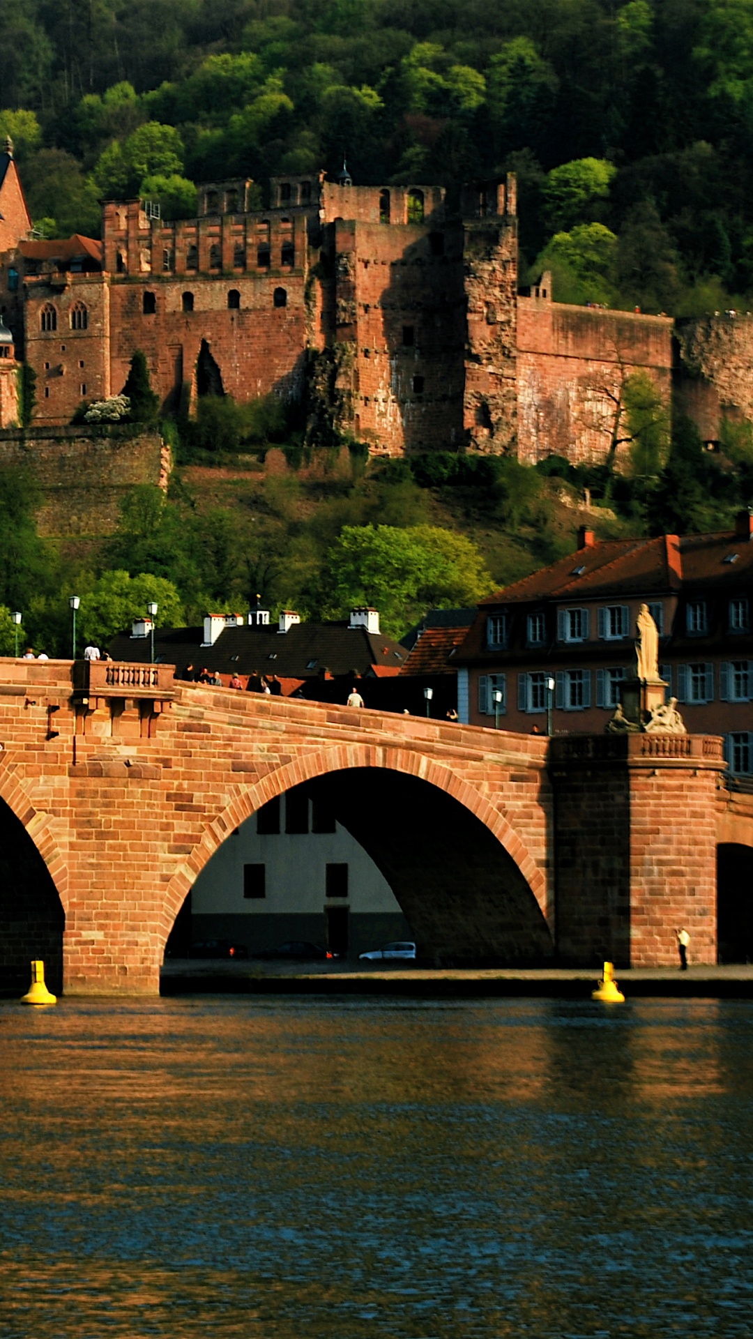 Brown Concrete Bridge Over River During Daytime. Wallpaper in 1080x1920 Resolution