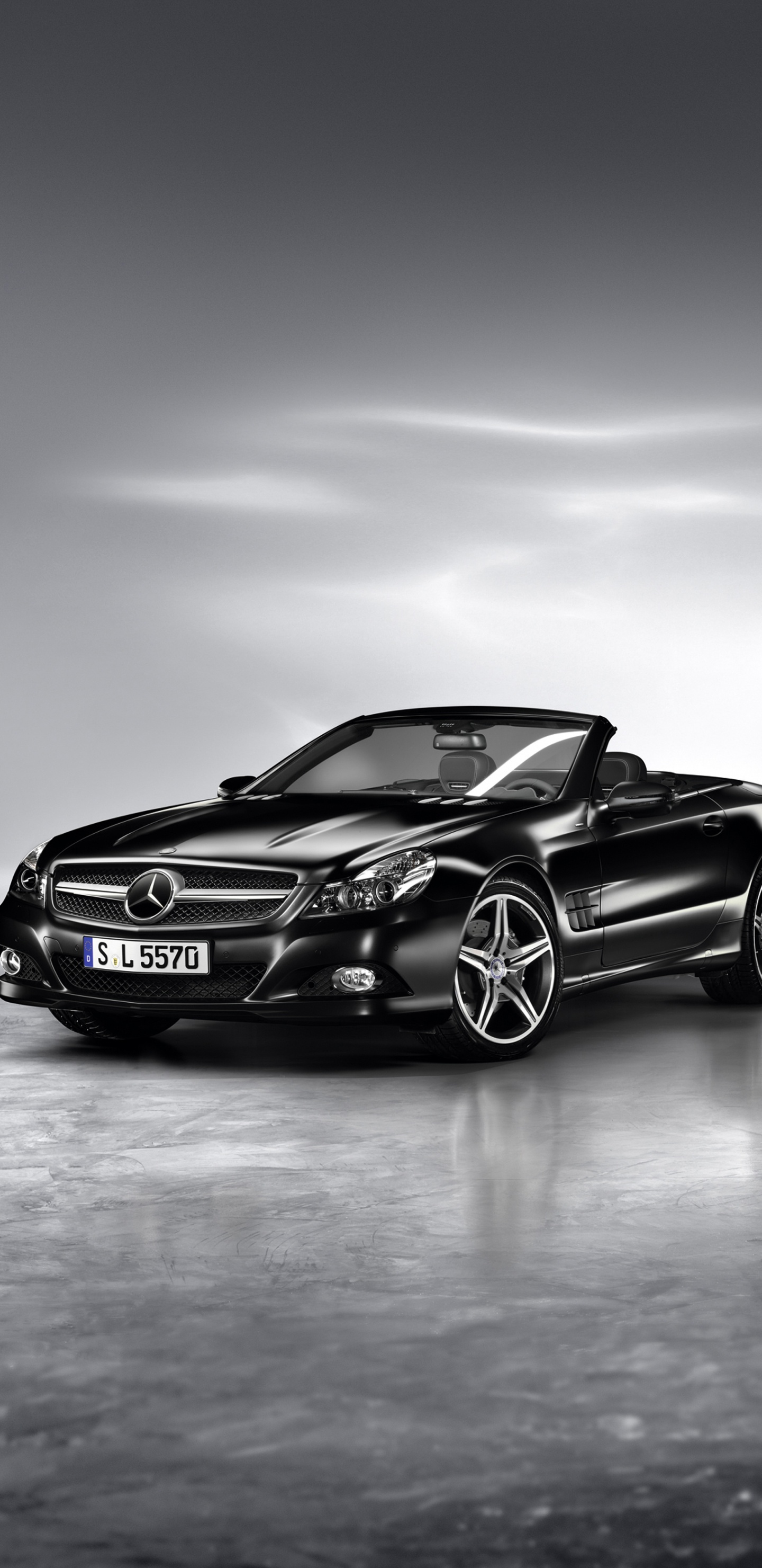 Porsche 911 Negro Sobre Pavimento Gris. Wallpaper in 1440x2960 Resolution