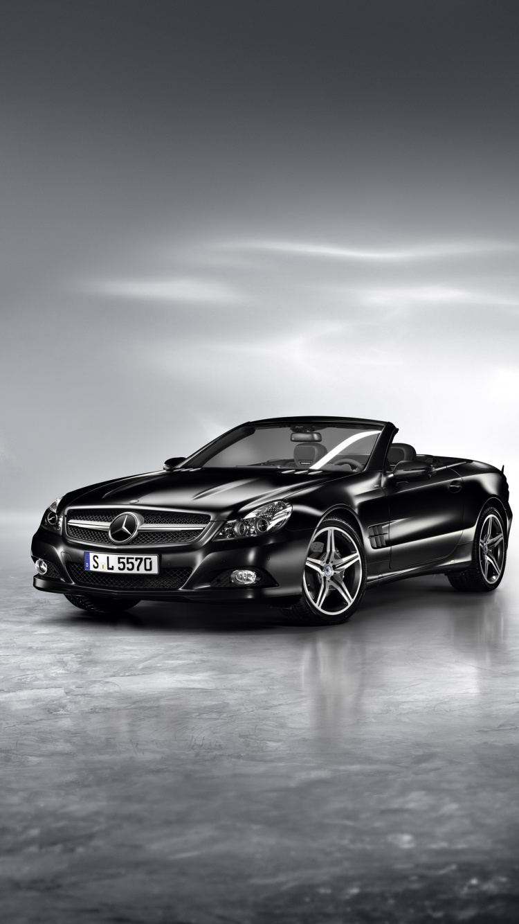 Schwarzer Porsche 911 Auf Grauem Bürgersteig. Wallpaper in 750x1334 Resolution