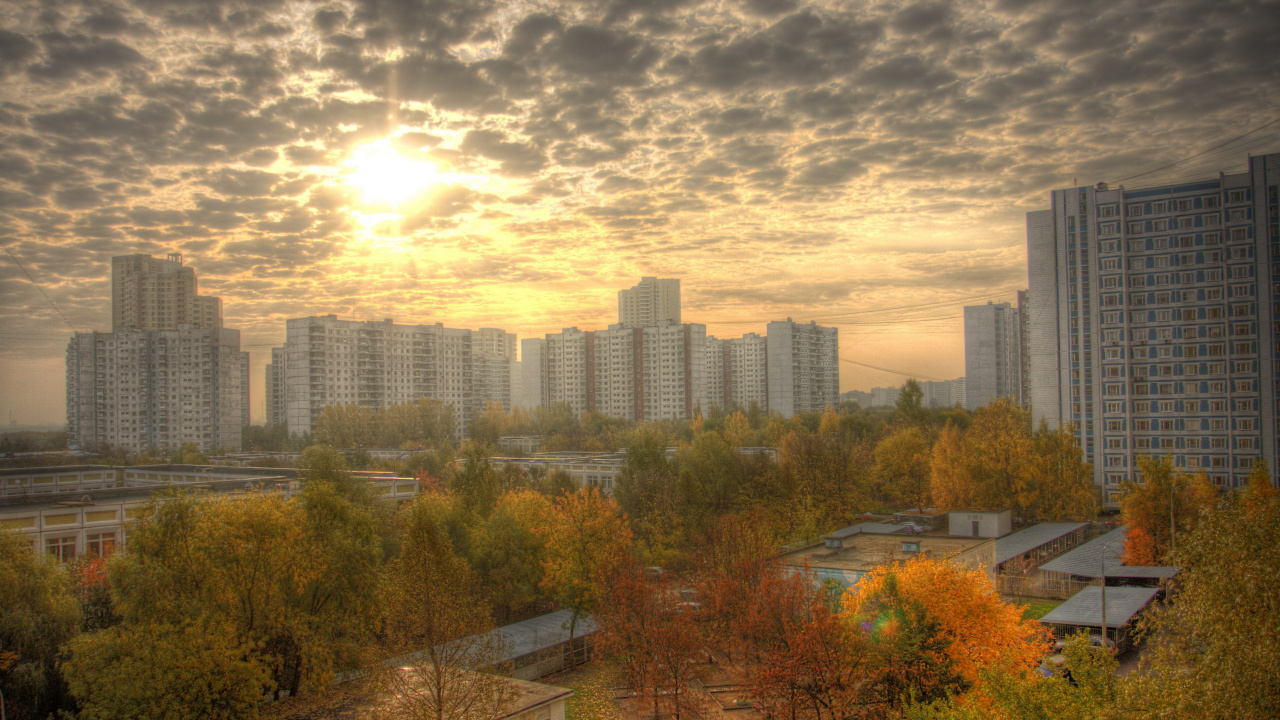 Cars Parked on Parking Lot Near High Rise Buildings During Daytime. Wallpaper in 1280x720 Resolution