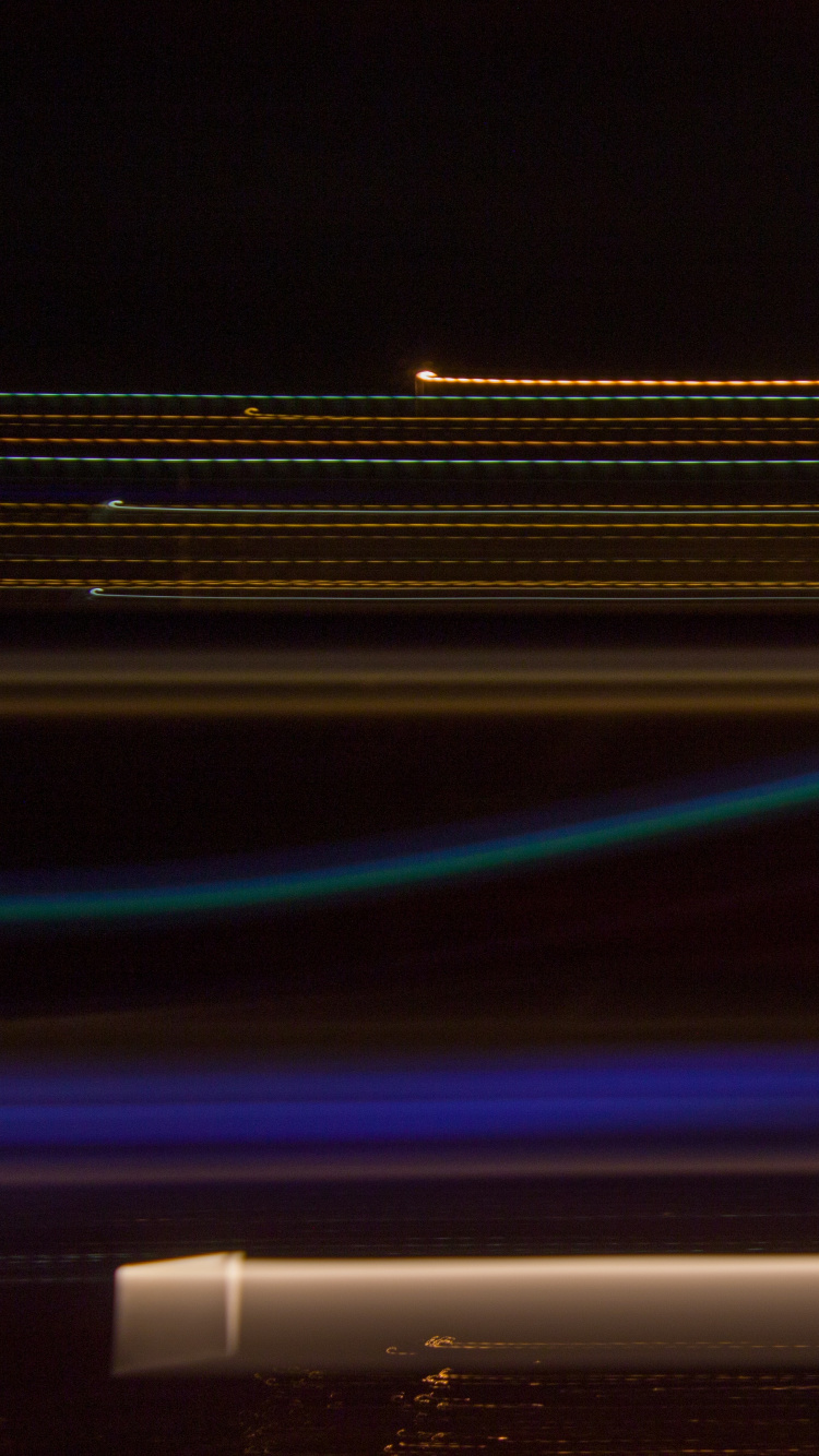 Time Lapse Photography of City Lights During Night Time. Wallpaper in 750x1334 Resolution