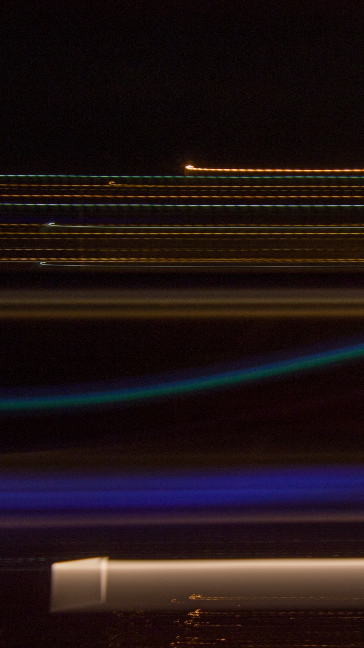 Photographie en Accéléré Des Lumières de la Ville Pendant la Nuit. Wallpaper in 720x1280 Resolution