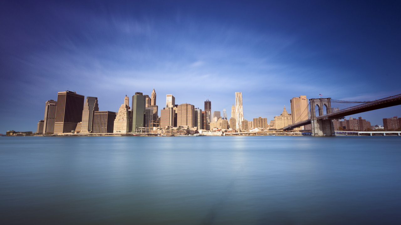 City Skyline Across Body of Water During Daytime. Wallpaper in 1280x720 Resolution