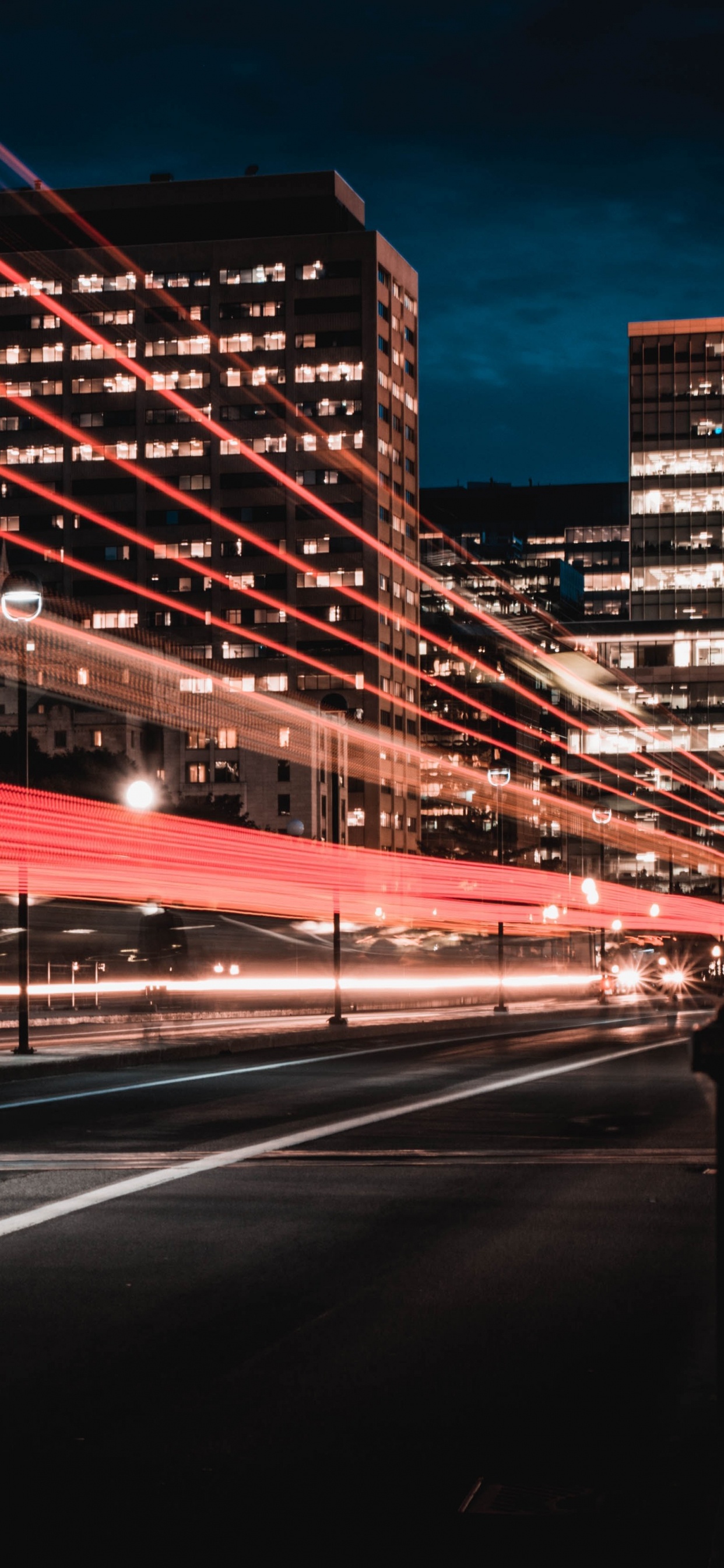 Time Lapse Photography of City Lights During Night Time. Wallpaper in 1242x2688 Resolution