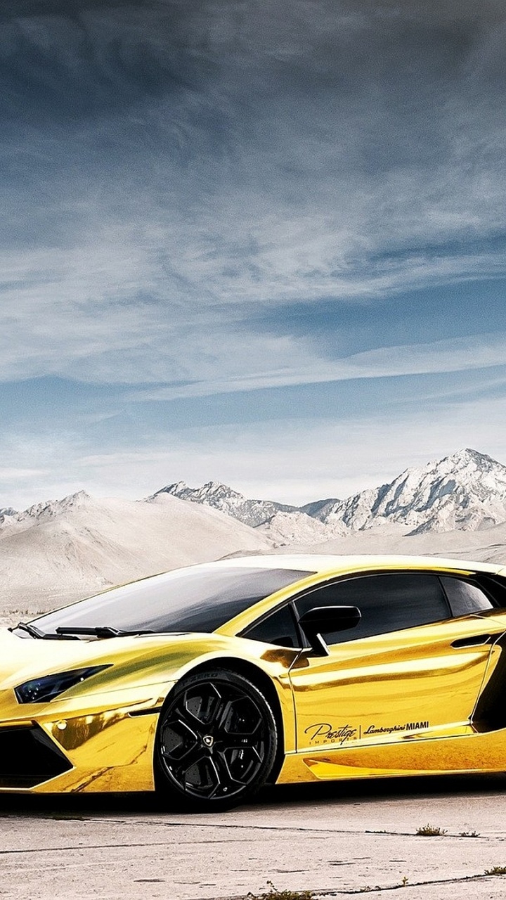 Yellow Lamborghini Aventador on Snow Covered Field During Daytime. Wallpaper in 720x1280 Resolution