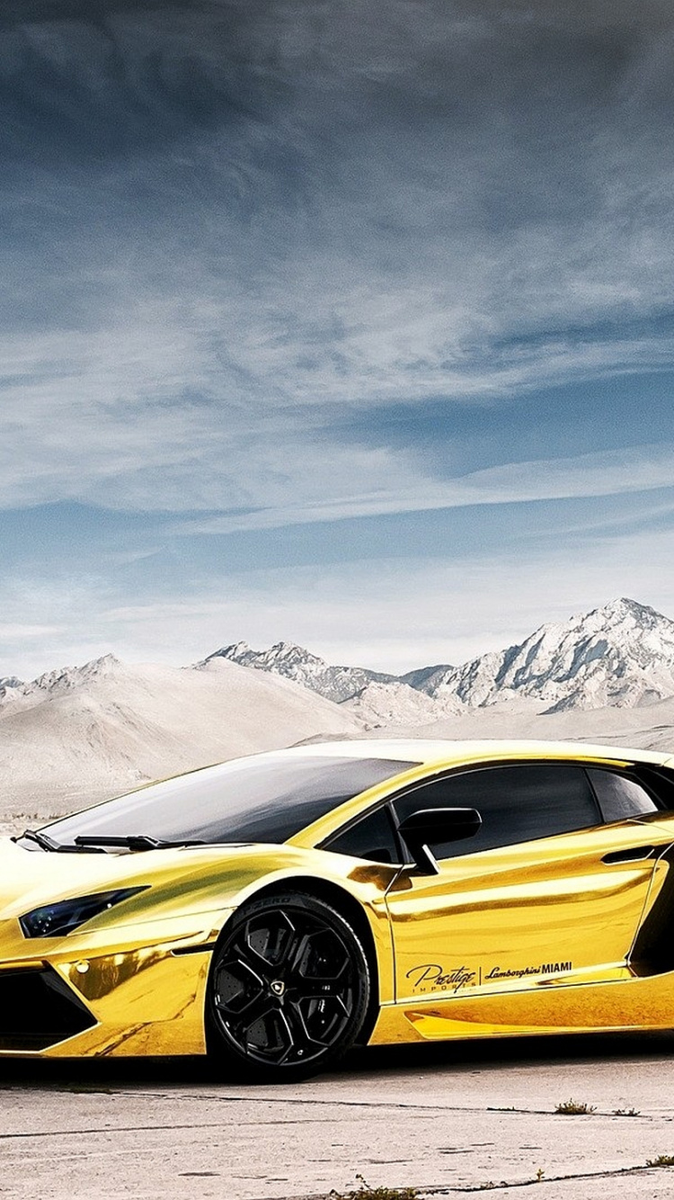 Yellow Lamborghini Aventador on Snow Covered Field During Daytime. Wallpaper in 750x1334 Resolution